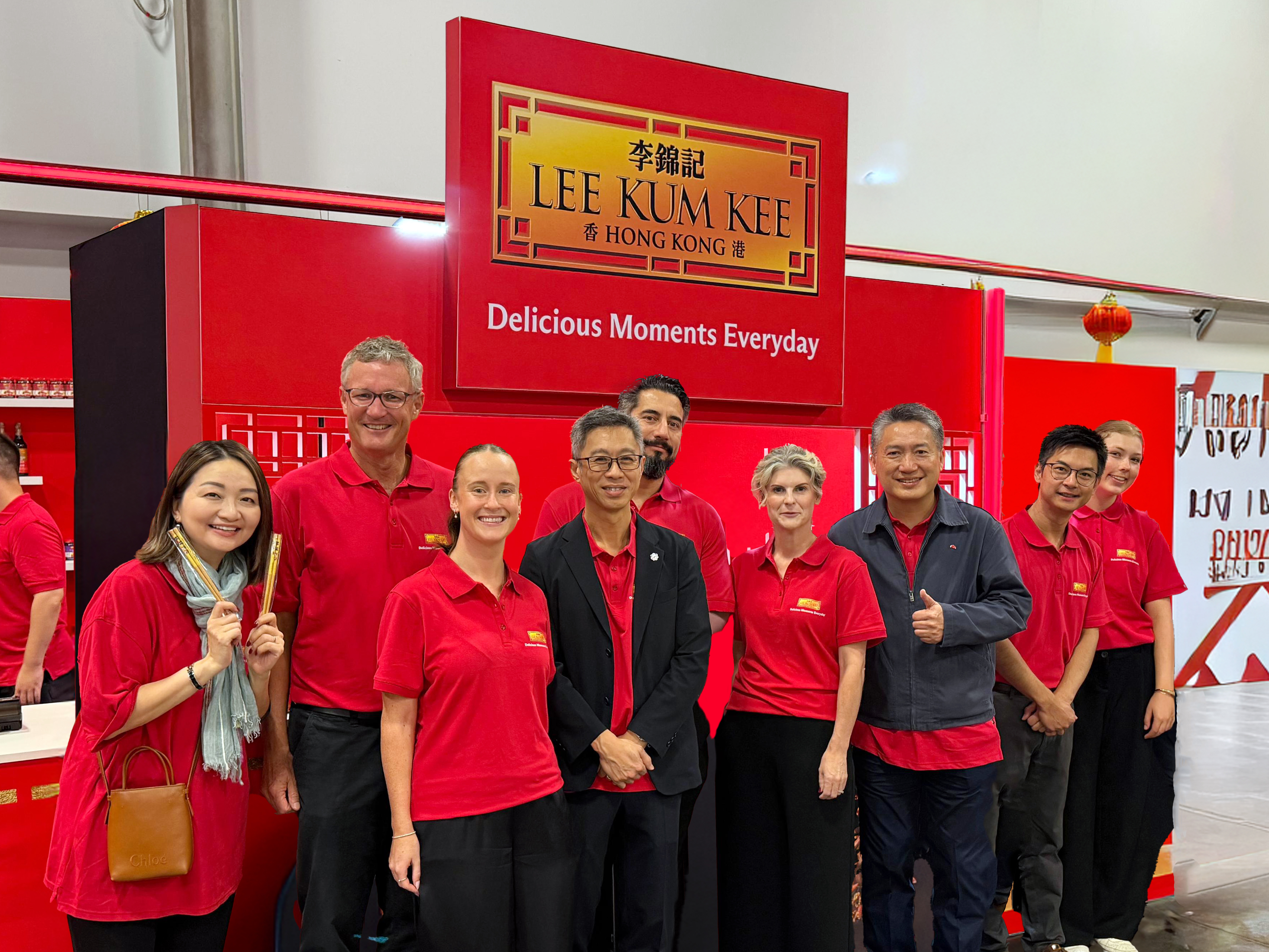 (Fourth from left) Vincent Wong, President - APAC of Lee Kum Kee Sauce, pictured with the New Zealand market team at the booth.