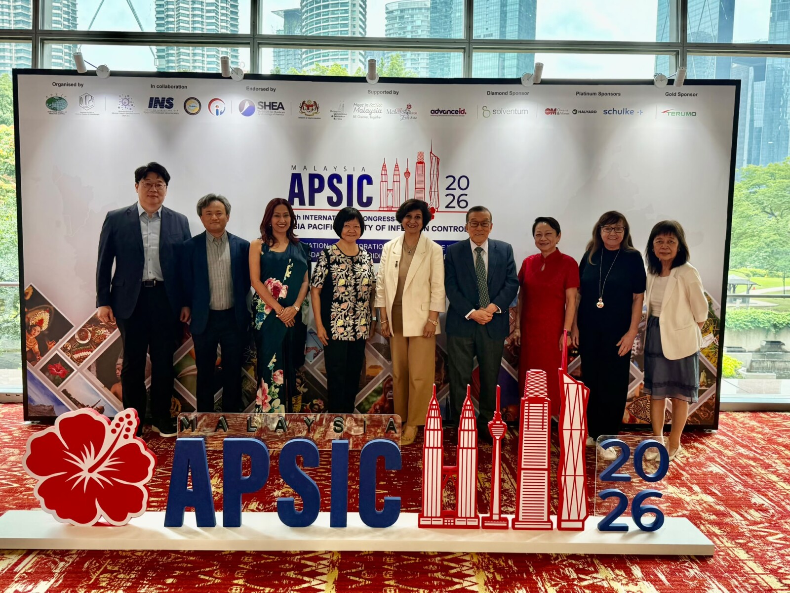 APSIC Executive Committee (ExCo) members and APSIC Environment Hygiene Excellence Award (APSIC EHEA) Expert Panel representatives at APSIC 2026 Malaysia. Pictured from left are Prof. Doo Ryeon Chung, Dr. Zhiyong Zong, Prof. Surinder Pada, Ms. Lily Lang Ren Lee, Dr. Namita Jaggi, Prof. Wing Hong Seto, Prof. Moi Lin Ling, Ms. Glenys Harrington and Ms. Patricia Tai-Yin Ching. The APSIC EHEA Expert Panel comprises Prof. Moi Lin Ling (Programme Chair), Prof. Anucha Apisarnthanarak (APSIC President, not pictured), Ms. Patricia Tai-Yin Ching (APSIC Vice President), Prof. Surinder Pada, Dr. Namita Jaggi and Prof. Sasheela Sri La Ponnampalavanar (not pictured).